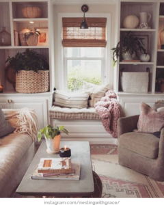 cozy living room with blankets and pillows